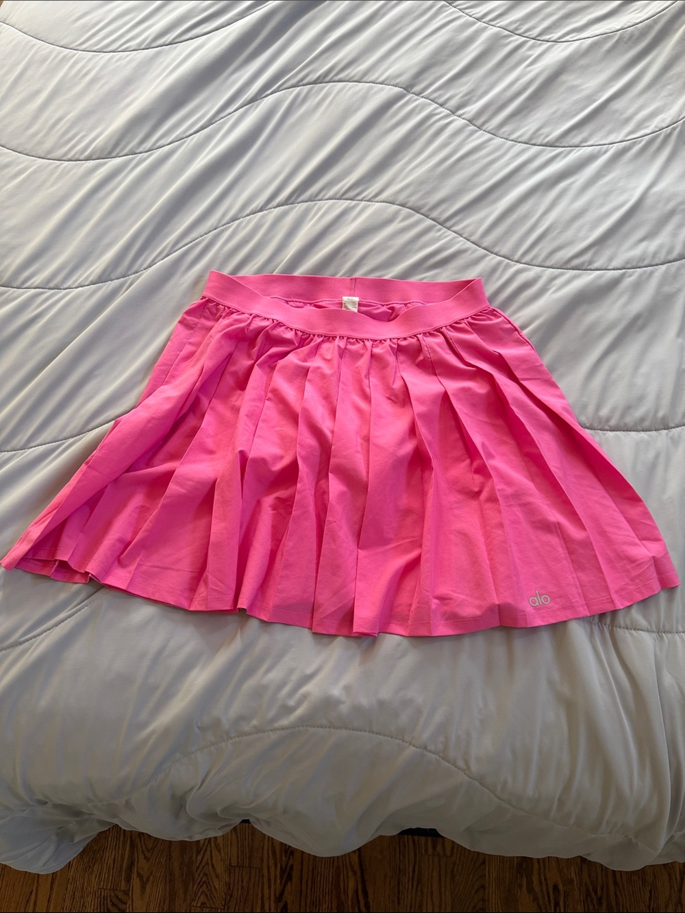 Alo varsity tennis skirt in hot pink